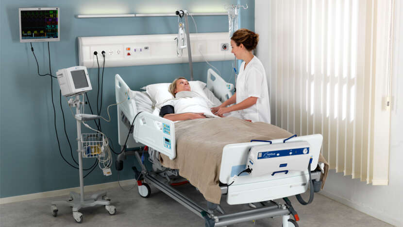 ArjoHuntleigh-Kownledge-Critical-Care-ICU-Enterprise-Bed-Diagnostics-Patient-Nurse-Nimbus_Product_Page_Main_Image.jpg